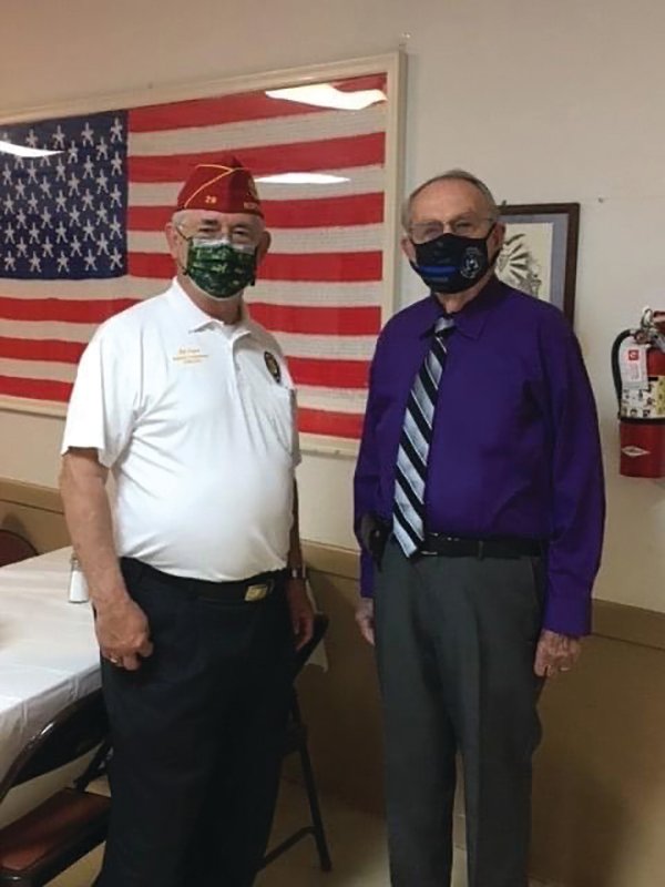 Hendry County Sheriffs Office Investigator, Don Munch, a 60 year member of the American Legion, meets with the National Commander of the American Legion, James W. “Bill” Oxford at LaBelle’s American Legion Post.
